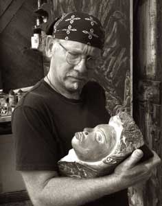 Marc Gould with his sculpture